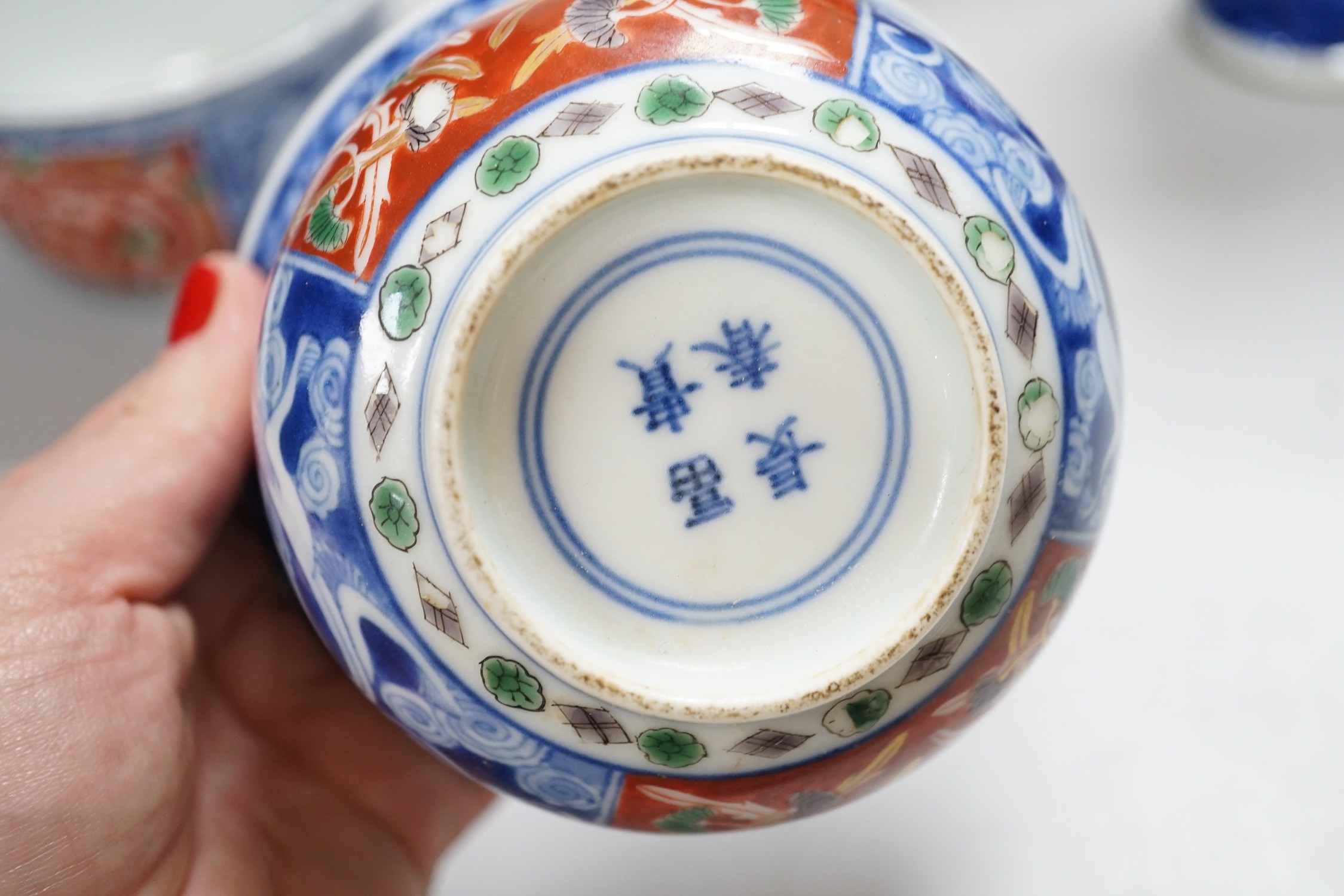 A Chinese prunus vase, 20cm, two Imari vases and a pair of Chinese bowls